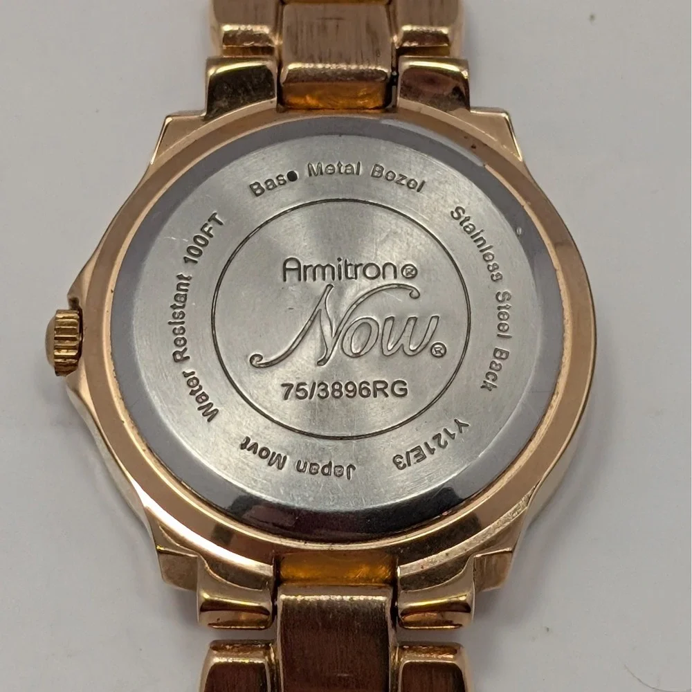 Armitron Now Womens Rose Gold Tone Cream Ceramic Bezel Watch 753896RG Untested